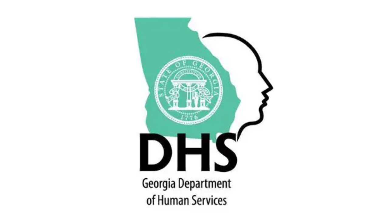 A green and white logo with the words " georgia department of human services ".
